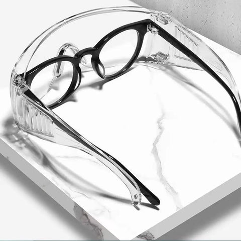Clear Safety Glasses For Lab Work With Anti Fog Coating, Splash Proof Goggles, Over Glasses Design on marble surface