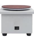 6 Inch Variable Speed Flat Disc Polishing Machine And Bench Grinder with sanding disc on top, durable iron construction for tool sharpening.
