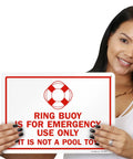 Woman holding a Ring Buoy Emergency Use Only Sign Not A Pool Toy 10 X 14 Aluminum Heavy Duty 40 Mil Rustproof Outdoor sign.