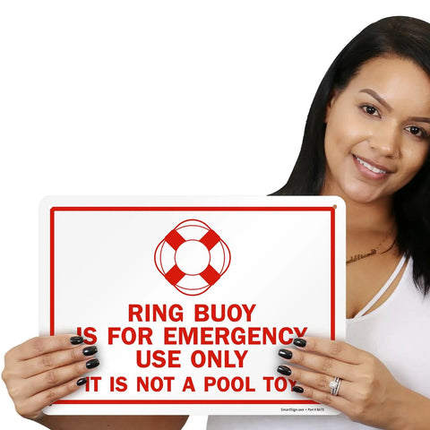 Woman holding a Ring Buoy Emergency Use Only Sign Not A Pool Toy 10 X 14 Aluminum Heavy Duty 40 Mil Rustproof Outdoor sign.