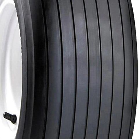 Close-up of Straight Rib Lawn And Garden Tire 13X5-6 Tire Only Rim Not Included with ribbed tread pattern for varied surface traction.