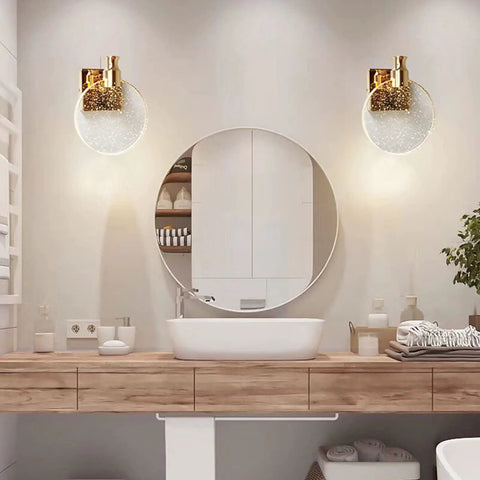 Bathroom with Crystal Bubble Wall Sconce LED Light In Nordic Gold Finish above mirror, cozy ambience and luxe glow