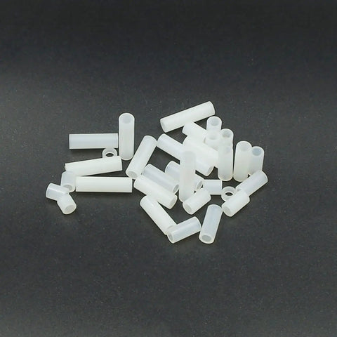 600 Pcs Nylon Spacers Set Unthreaded Round Standoffs 4mm OD 2.8mm ID White Wall Plate Spacers Kit For M2.5 Screws, Clearance Spacers, DIY Electronics, Nerdy Builder Friendly Variety Lengths. White nylon unthreaded round spacers in assorted lengths on black background