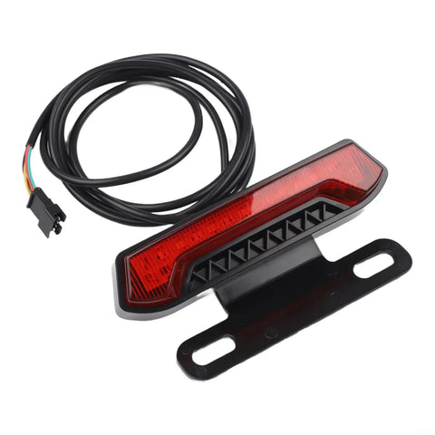 Must Have E Bike Tail Light For 24 To 48V Systems Packed With Super Bright Led Rear Lamp That Flashes During Brakes And Stays Lit At Night Ensuring You Stay Safe And Visible On The Road While Rocking That Cool IPX4 Water Resistance Level. red ABS e-bike tail light with 150cm cable and rear rack mount