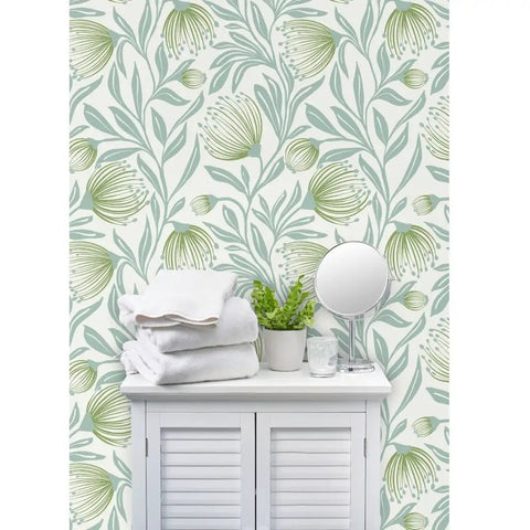 Top Shelf Botanical Modern Wallpaper With A Smooth Matte Linen Texture Pvc Free Heavy Duty Covering For Kitchens Baths Or Hallways Paste To Paper Built Tough For Daily Grind Ordered Fresh Just For You, featuring green botanical patterns behind a towel rack.