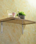 Kickass Heavy Duty Steel Corner Braces For Shelves And Walls Straight Up L Shape angle iron supports mounted under a wooden shelf.