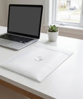 200 Pack Foam Packing Pouches And Sheets Cushion Wrap 11.8x9.8 Inch on desk near laptop and plant