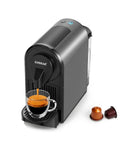 Top Tier Espresso Maker For Nes Pods With 20 Bar Italian Pump And One Touch Brewing 1400 Watt Automatic Coffee Brewer In Sleek Gray brewing espresso into a glass cup.