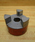 L-1501.125 Jaw Coupling With 1.125 Inch Bore And 3.75 Inch Outer Diameter, Keyway Size 0.25 By 0.125 Inch on wooden surface