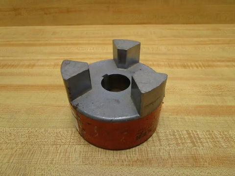 L-1501.125 Jaw Coupling With 1.125 Inch Bore And 3.75 Inch Outer Diameter, Keyway Size 0.25 By 0.125 Inch on wooden surface