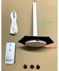 Components of Lighthouse Tiffany Style Stained Glass Accent Table Lamp including remote, USB cable, and LED base.