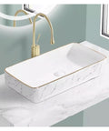 USZWBY Vessel Sinks Nordic Light Luxury Modern Above-Ground Basin Household Wash Single Bathroom Balcony Ceramic Bathroom Bowl Sink on marble surface with gold faucet.