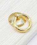 Close-up of 29mm Dope Gold Cabinet Ring Pull on wood, part of Set Of 6 For Dresser Drawers Wardrobes And Kitchen Cabinets Vintage European Style