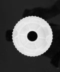 Close-up of white gear from 550 Gear Box Set For Kids Must Have Ride On Car Replacement Gears Kit Large Middle Small