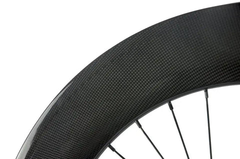 Close-up of Ride Ready 88mm Fixed Gear Wheel 700c Carbon Clincher Rear Wheel showing 88mm depth and 32 spoke configuration.