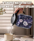 Hand pouring from vintage floral teapot with V shaped spout into cup