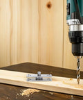Stainless Steel Concealed Pivot Hinge Delivering Smooth As Butter 360 Rotation For Cabinets, drilling into wood with hinge attached.