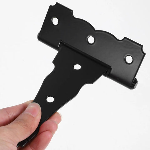 Hand holding Heavy Duty Gate Hinges With Matte Black T Shaped Iron Two Pack Sturdy Farmhouse Style Decorative Hardware