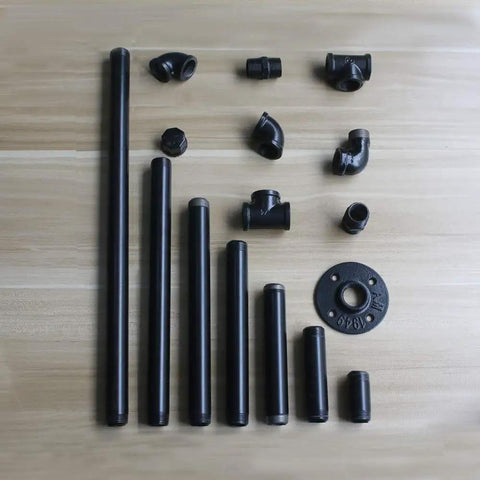 Top Shelf 3/4 Inch Black Malleable Iron Floor Flange 10 Pack Rock Solid Pipe Connector assortment of black pipes and fittings.