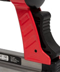 Close-up of handle on Oil Free Pneumatic Staple Gun for wood upholstery carpet and wire fencing fits one quarter inch through nine sixteenth inch staples.