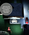 Outdoor Motion Sensor Flood Light Bulb 90W Replacement illuminating backyard with red car parked, viewed from above