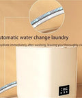 Hassle Free 7L Portable Washer Dryer with automatic water change feature and digital control panel for easy use.