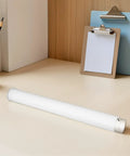 Extendable Plastic Mailing Tubes With Sealed Caps 4 Pack For Poster Artwork And Document Storage on a desk