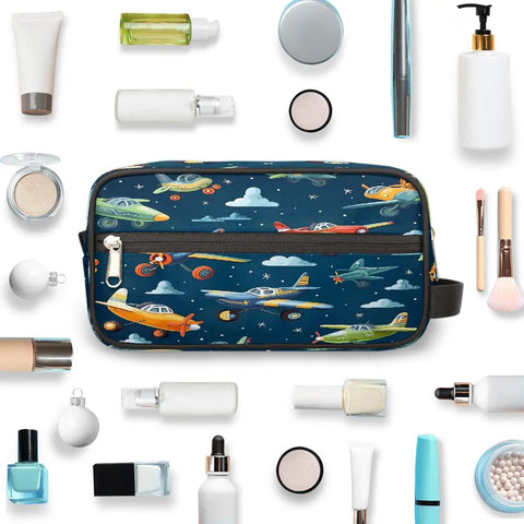 Cartoon Airplane Makeup Bag Travel Toiletry Case For Women And Men Dopp Kit surrounded by cosmetic items