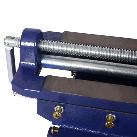 Close-up of Ironclad 5 Inch Cross Slide Vise For Drill Press And Milling Machines showing precision threaded screws and clamp details.