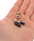 Slick Jump Rope Screw Kit With Adjustable End Caps For Heavy Duty Speed Ropes Keeps Handles Tight During Crazy Gym Workouts Perfect Fit For Serious Trainers And Clubs Prevents Loosened Parts, metal screws with black end caps in hand