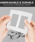 Hands holding 2-Gang Decora Wall Plate Cover White Durable Unbreakable Polycarbonate Electrical Faceplate for demonstration