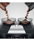 Top Shelf Fully Automatic Commercial Coffee Station Featuring Six Point Seven Inch Touchscreen Interface with dual bean containers.