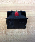 Tough As Nails ZB2 BE102 Industrial Push Button Base Block 10 Amp 600 Volt viewed from the front on a wooden surface.
