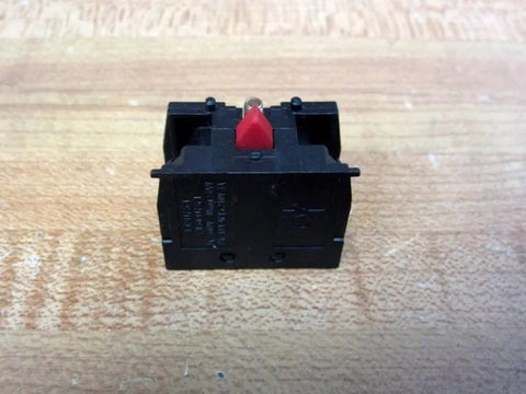 Tough As Nails ZB2 BE102 Industrial Push Button Base Block 10 Amp 600 Volt viewed from the front on a wooden surface.