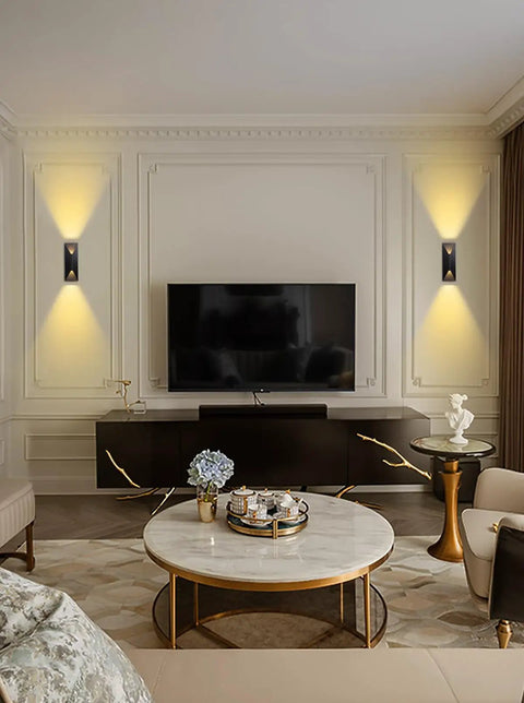 Interior view with up and down dimmable LED wall lights for outdoor use, sleek modern design beside TV, 3000K warm white light.