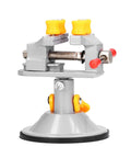 Heavy Duty Mini Suction Cup Vise Bench Mount 360 Rotation Universal Desktop Clamp For Woodwork That Grips Like Crazy And Holds Dead Center On Any Flat Work Surface, gray color, with yellow knobs.