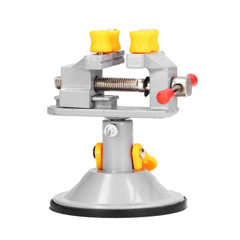 Heavy Duty Mini Suction Cup Vise Bench Mount 360 Rotation Universal Desktop Clamp For Woodwork That Grips Like Crazy And Holds Dead Center On Any Flat Work Surface, gray color, with yellow knobs.