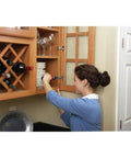 Person using Cordless Screwdriver With Forward And Reverse Switch, Manual Screw Driving Option, for cabinet installation