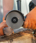 Angle grinder in use with 2 Pack M14 And 5/8-11 Thread Angle Grinder Flange Nuts With Quick Release Locking Nut for cutting wood