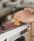 Pro Grade Abrasive Cleaning Stick for Sanding Belts and Discs, 8-1/2 Inch Natural Rubber Eraser cleaning a sanding belt