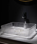 Square Clear Glass Vessel Sink Slick Finish Zero Hassle Cleanup Bathroom Vanity Basin Top Tier Modern Hotel Washbasin with polished copper drain on counter.