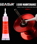 Fishing Reel Oil and Grease Kit Two Piece shown with red spool and lubricant application close-up.