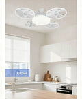 MENGLANSI Flush Mount Fan Light in a bright kitchen, featuring a modern design with four fan blades and a round light fixture.
