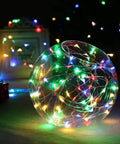 Outdoor Battery Powered Fairy Lights With Timer, 33 Ft Of 100 LED Cozy Warm White Glow Waterproof String Lights display in glass orb.