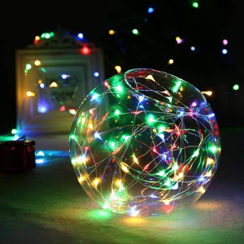 Outdoor Battery Powered Fairy Lights With Timer, 33 Ft Of 100 LED Cozy Warm White Glow Waterproof String Lights display in glass orb.