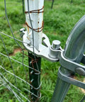 Heavy Duty T Post Gate Hinge Assembly Kit With Galvanized Steel Pins And Female Brackets For Chain Link Fences Quick No Sweat Install close-up of hinge on T post.