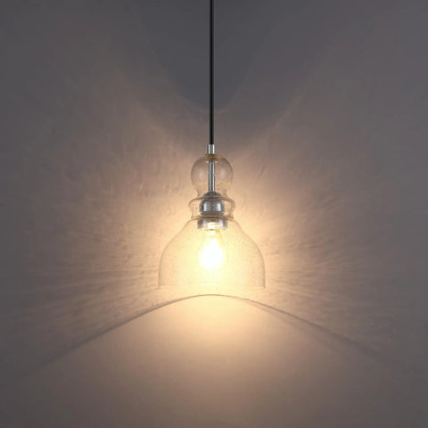 Two Pack Pendant Lights With 6.5 Inch Hand Blown Seeded Glass And Brushed Nickel Finish, illuminated glass pendant detail view.