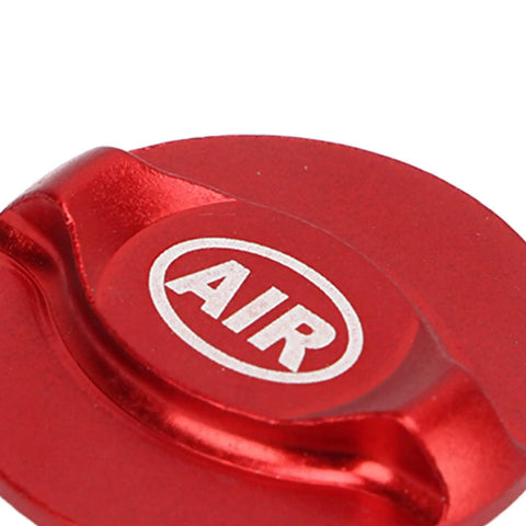 Close-up of red Two Pack Red Front Fork Covers for Mountain and Road Bikes, Electroplated Aluminum Shock Absorption Caps