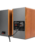 Rear view of R1280T Powered Bookshelf Speakers With 2 Channel Near Field Studio Monitor Sound Wooden Enclosure, showing inputs.