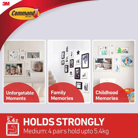 Damage-Free Picture Hanging Strips White Grip Up To 12 Lbs For Indoor Use Includes 4 Pairs 8 Strips For Frames Up To 18 By 24 Inches No Nails No Mess Decor Solution displayed showing its strong hold on frames and decor.